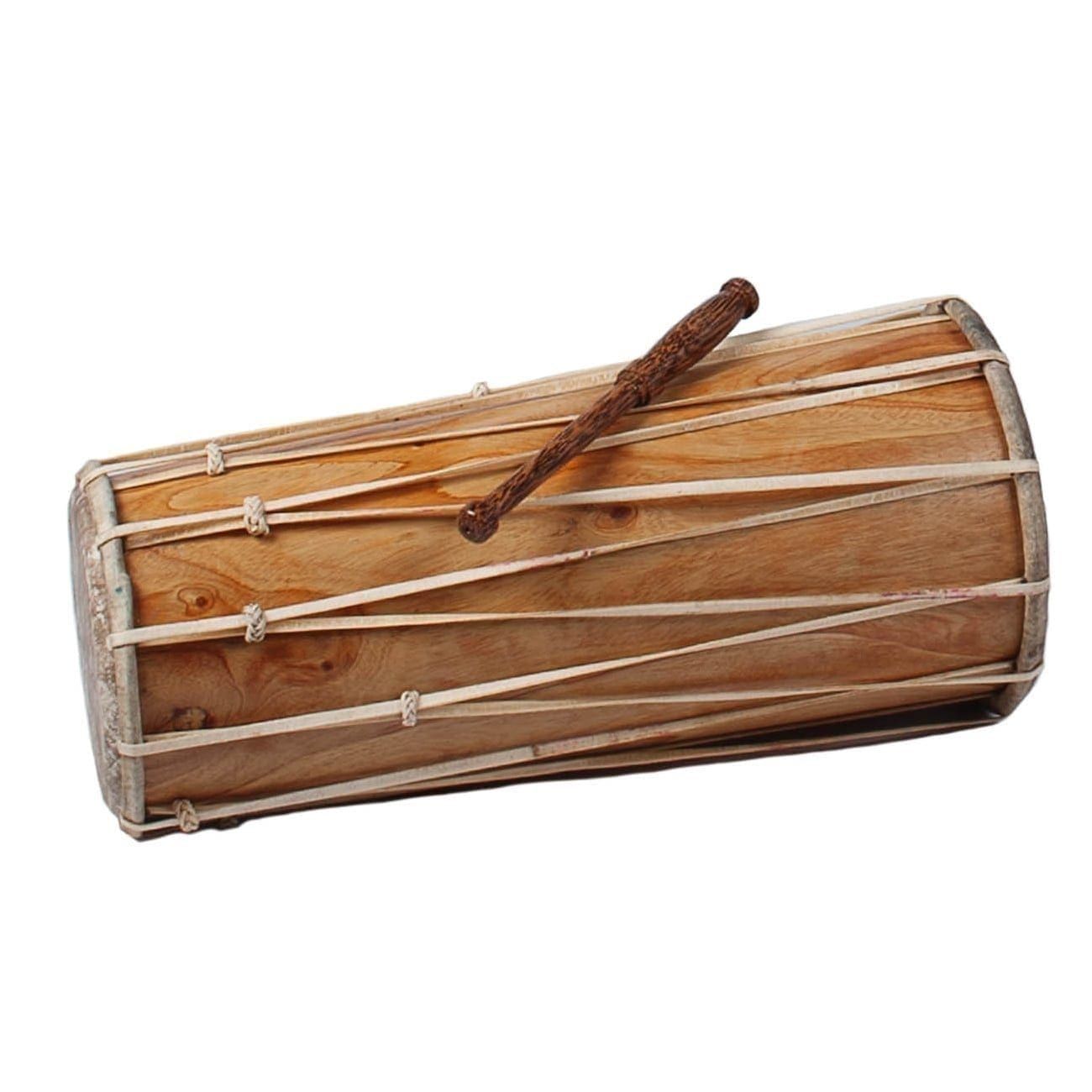 This is a product image of the Balinese Drum - 60cm. It is laid horizontally from small head to large head, with the beater laid on top. It is made of wood and has leather straps running back and forth around the length of the shell to hold the drum heads tight in place.