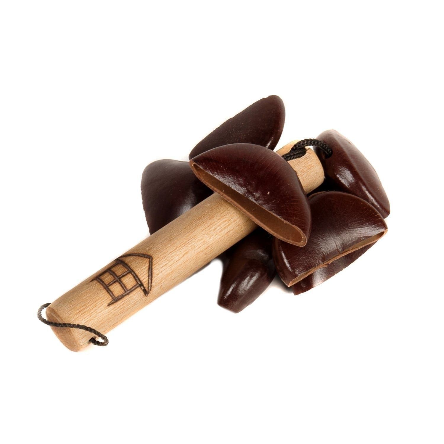 This is a product shot of a Bento Shaker. It has a wooden handle with a design burnt into the wood. At the top are many Bento seeds are attached which make the shaker sound. The shaker is laid down pointing up and to the right.