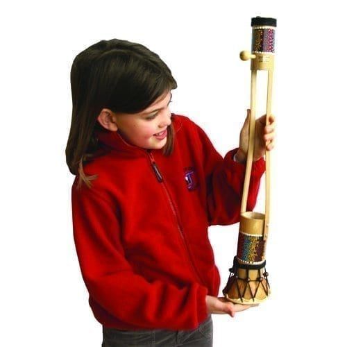 Begijen Guitar Medium 50cm held by pupil; bamboo frame with small drum and single string, beaded bands