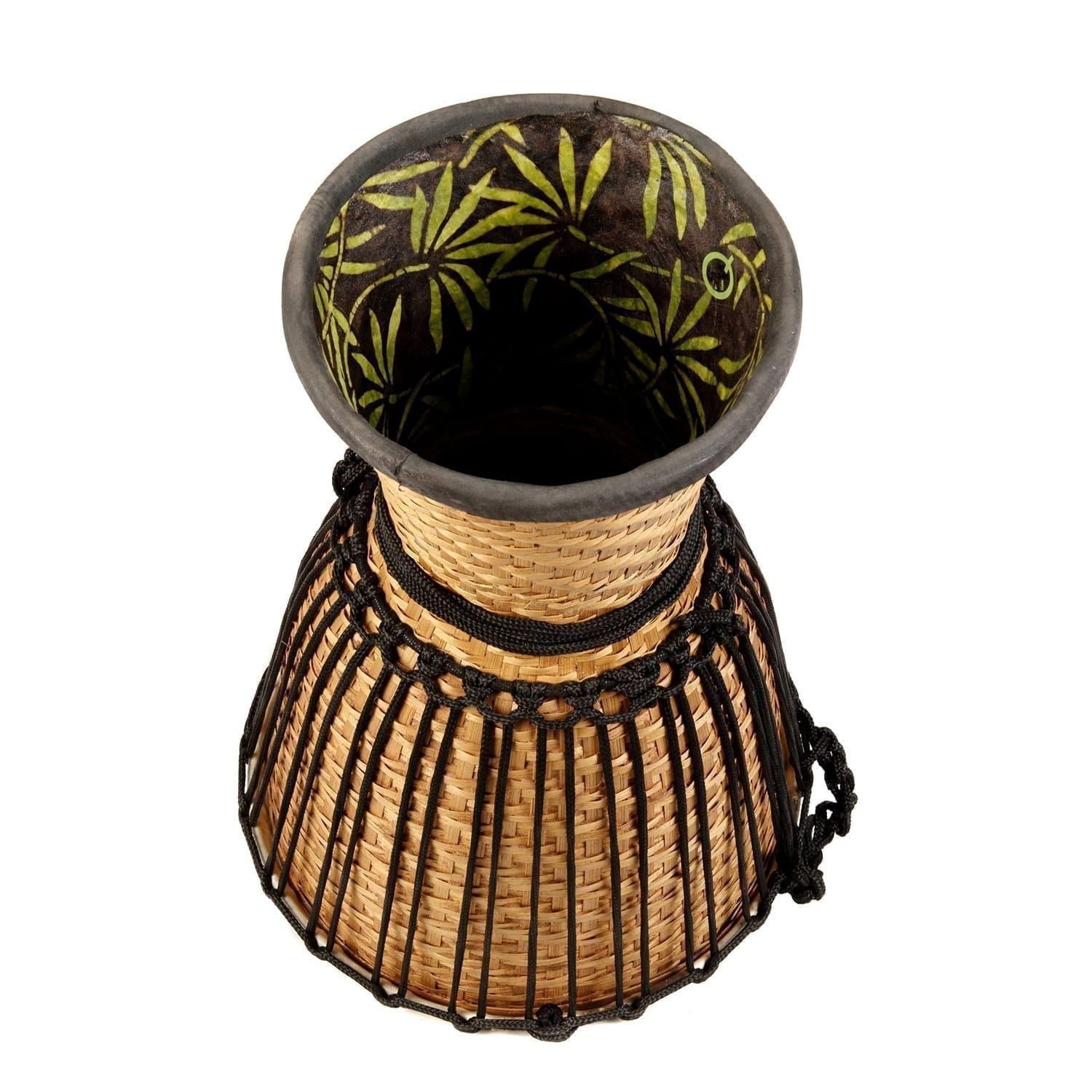 This 12-inch diameter, 50cm high Djembe drum is shown upside-down, highlighting the handwoven bamboo frame, black rope tuning, and decorative fabric lining the interior.