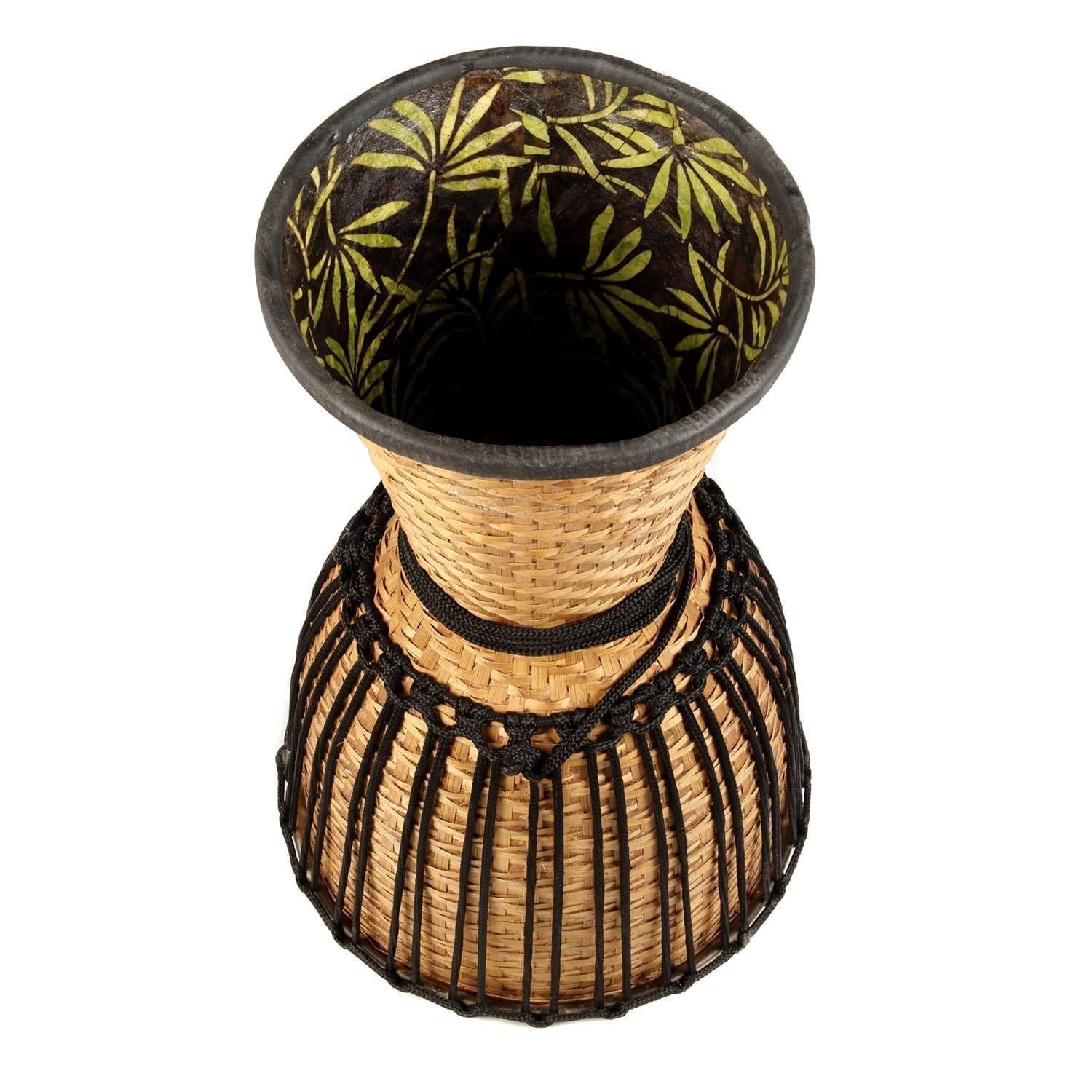 This 14-inch diameter, 60cm high Djembe drum is shown upside-down, revealing its intricate handwoven bamboo construction and decorative interior fabric lining.
