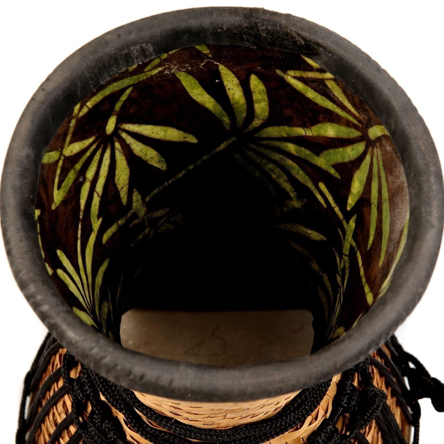 Inside view of an 8-inch diameter, 30cm high Djembe drum, showcasing the decorative fabric lining the interior and the handwoven bamboo construction.