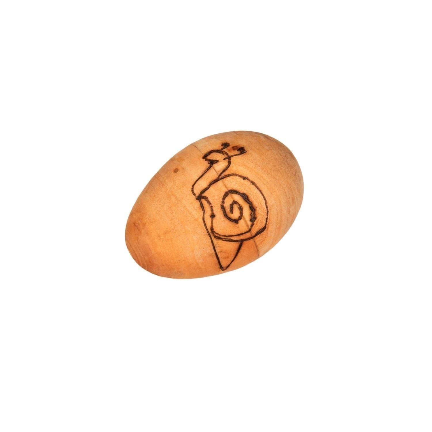 This is a product image of the Egg Shaker - Large - 9cm, Early Years. It is a simple wooden egg shape with a snail design burned into the side as decoration.