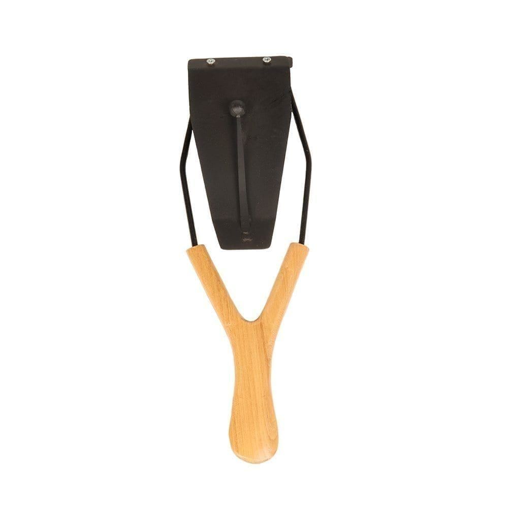 This is a product image of the Flexitone. The instrument is facing from straight up, and has a light wooden handle.