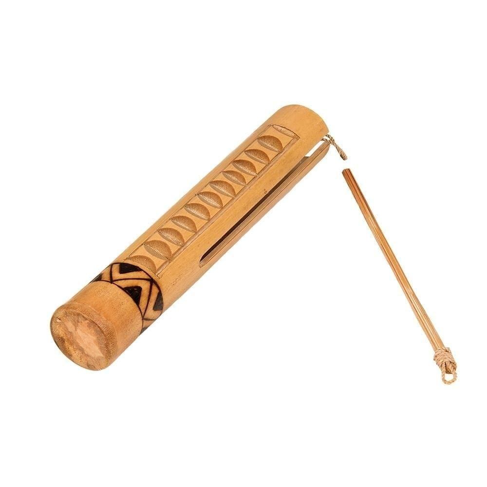 Small bamboo guiro percussion instrument with natural ridges, producing rhythmic Latin American sounds for musicians and classrooms.