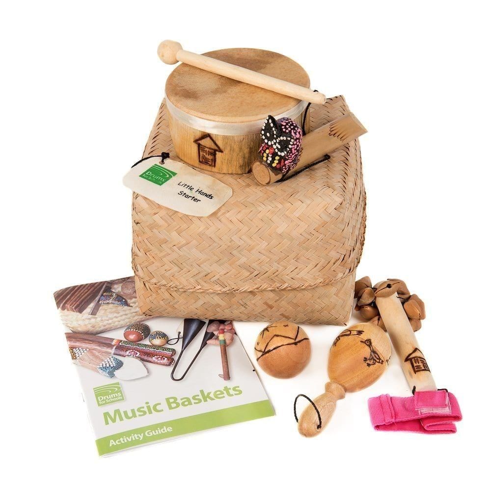 This is a product image of the Little Hands Starter Basket - 5 Instruments. All five instruments are stacked together and include one Bamboo Mini Drum, one  Ball Shaker - 5cm, Early Years - Early Years, one Wind Chime - Early Years, one Kenari Shaker - Early Years, one Music Bracelet - XS, one Egg on Stick - Small - 5cm, Early Years.