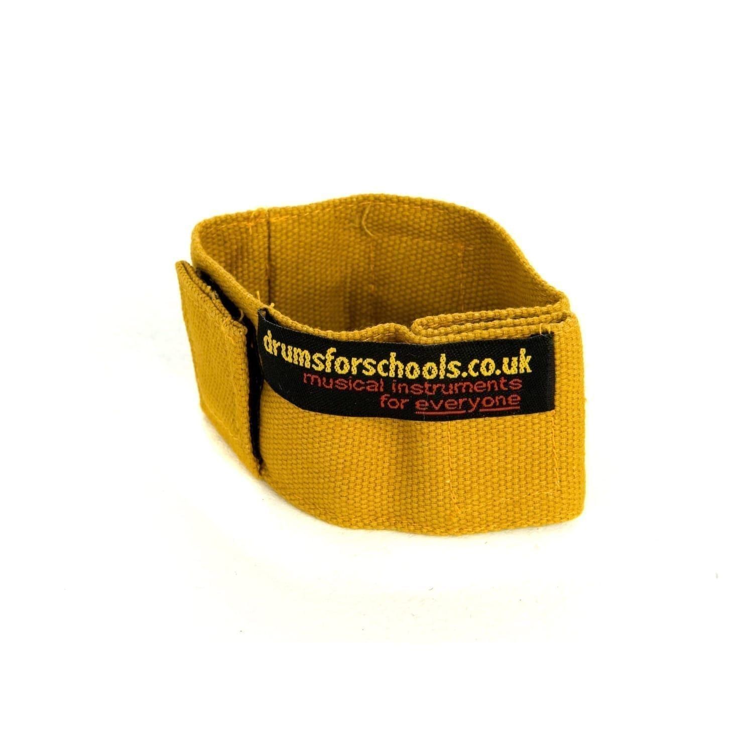 This is a product image of the Music Bracelet - small. It is yellow in colour and has a couple of Velcro loops for attaching shakers and other instruments.