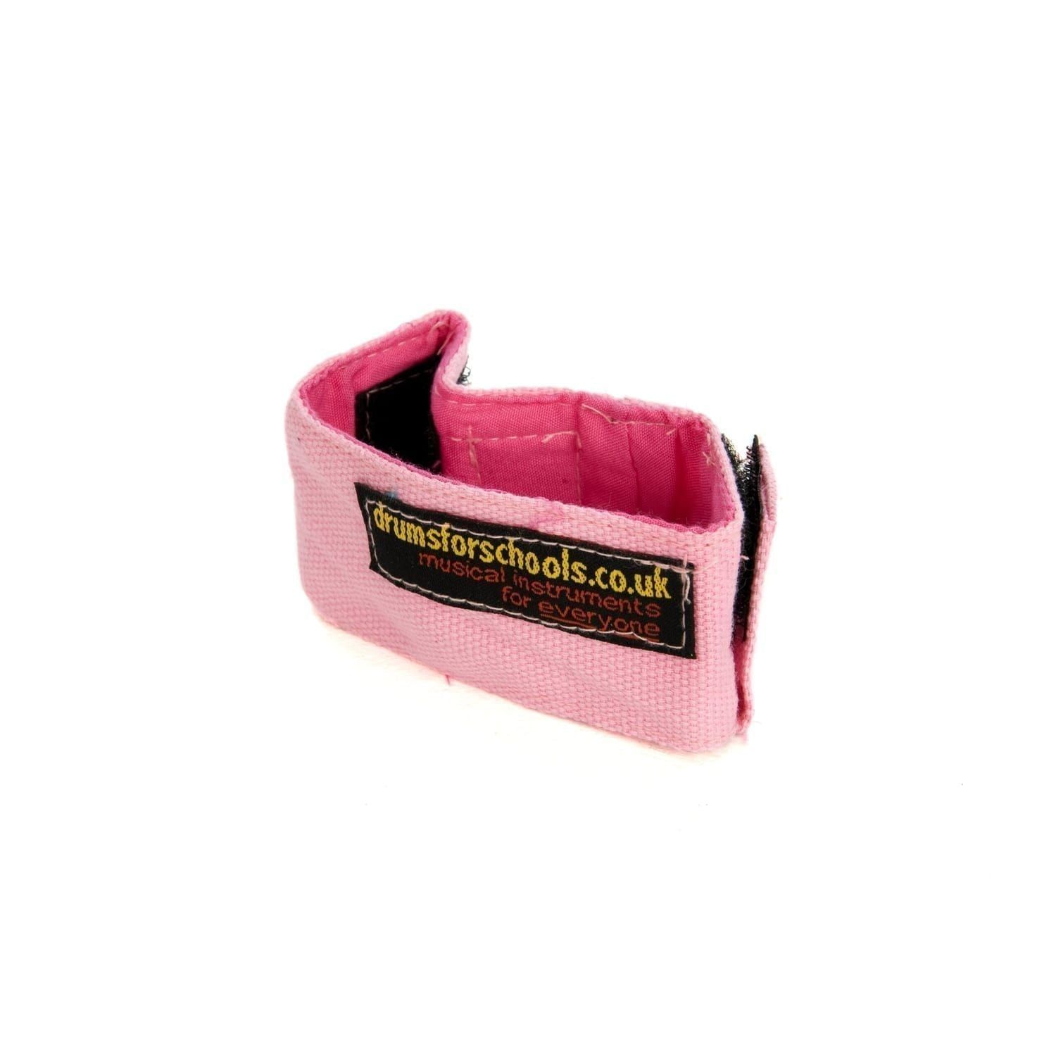 This is a product image of the Music Bracelet - XS. It is pink in colour and has a couple of Velcro loops for attaching shakers and other instruments.