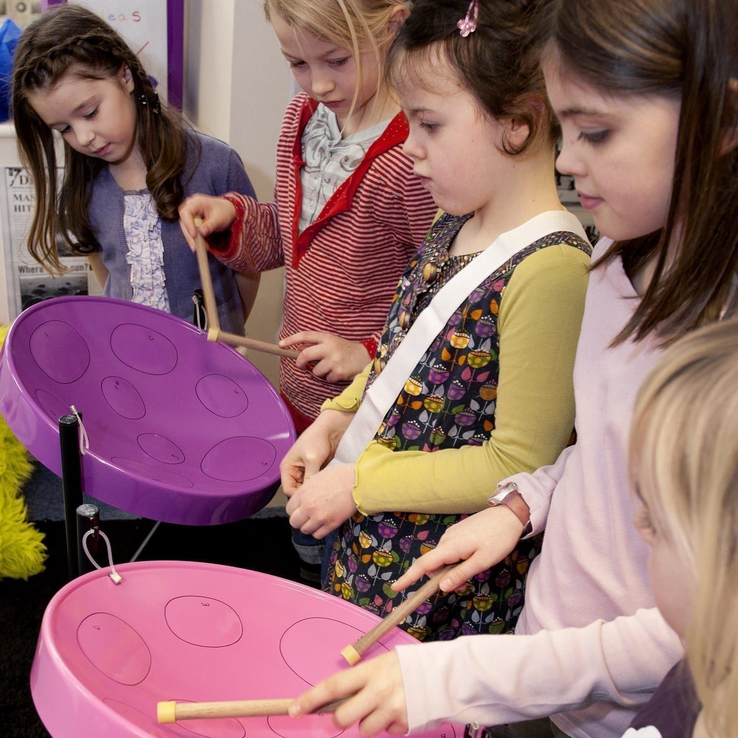 Image of Primary students playing Drums for School's Caribbean Steel Pan 