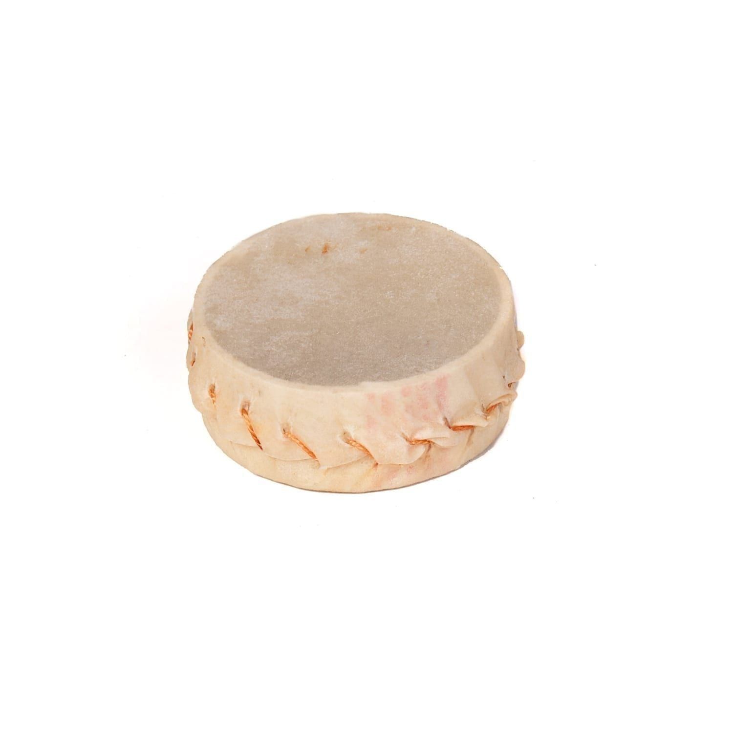 This is a product image of the Squeezer Shaker. It is a small goat skin box, stitched together with seeds on the inside.