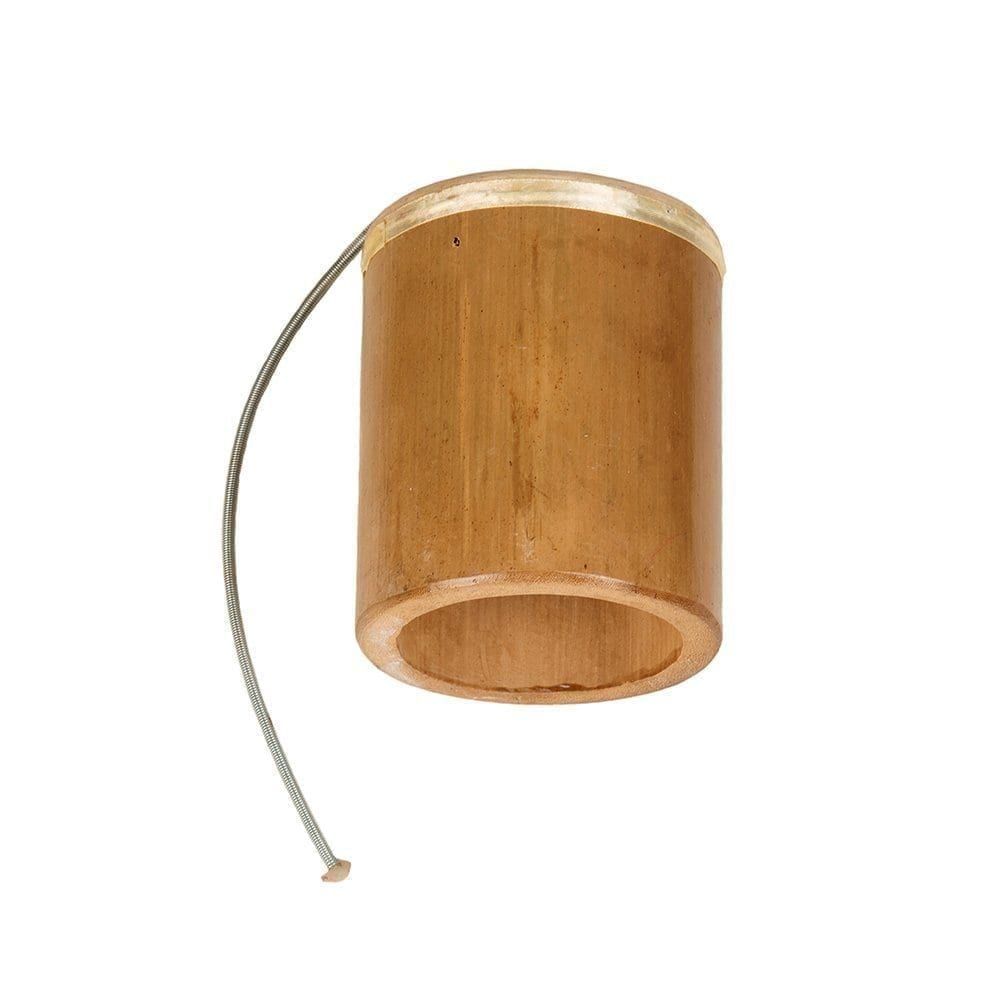Thunder Drum - 4in diameter, 15cm high, bamboo. It is a bamboo tube with a stretched skin at one end, through which a loose metal spring is attached. The instrument is laid flat.