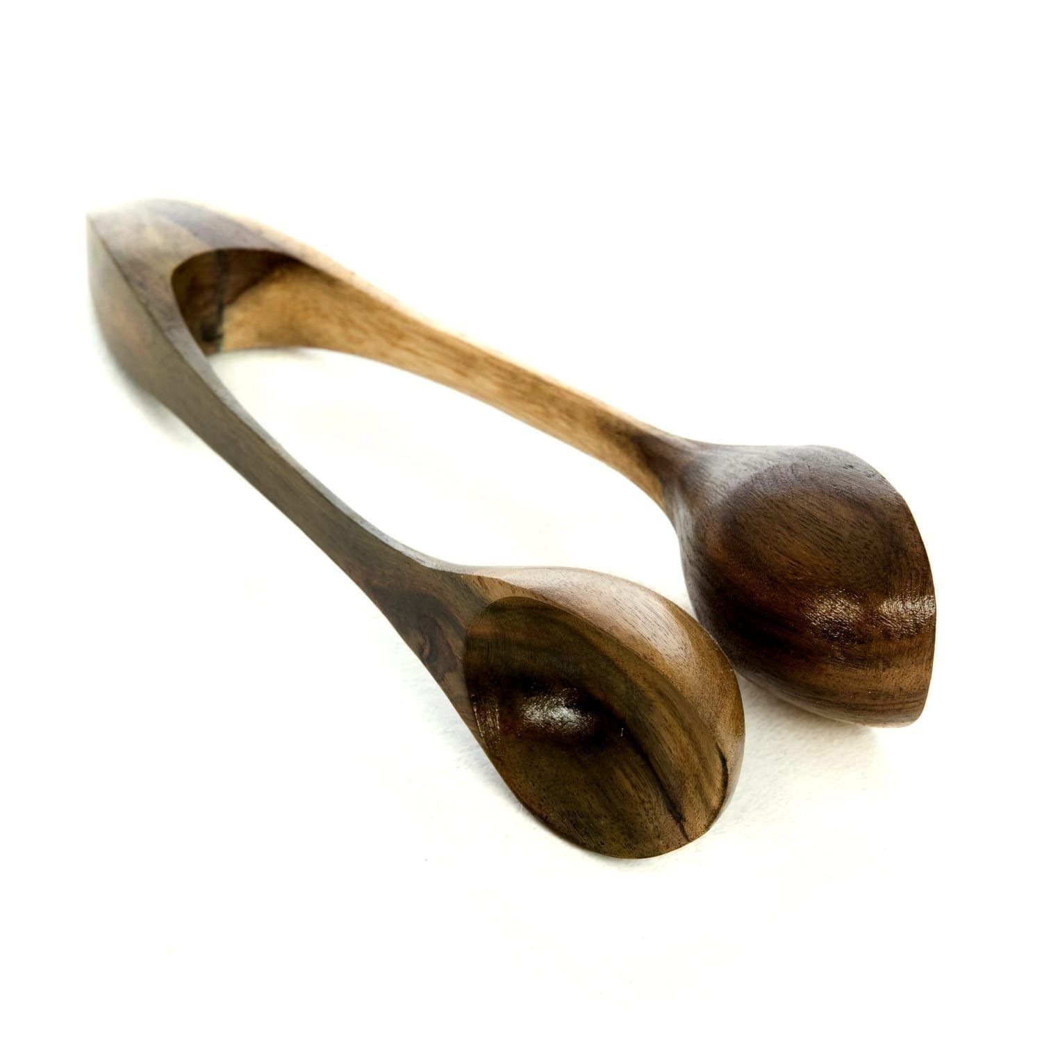Hand-carved wooden spoons instrument from Suar wood. Play by slapping on hand or leg for fun clippity-clop tones.