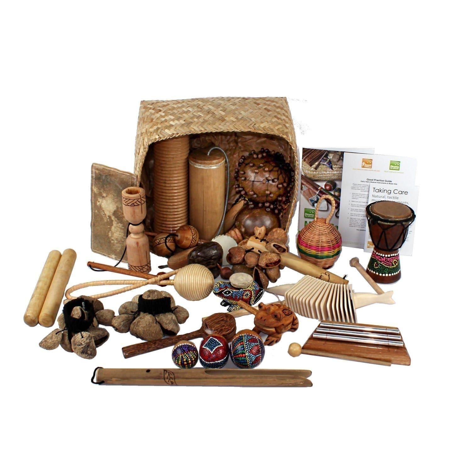 This is a product image of the World Music Basket - Medium - 23 Instruments. The large array of products are presented within and around the Storage Basket, with the documentation either side.