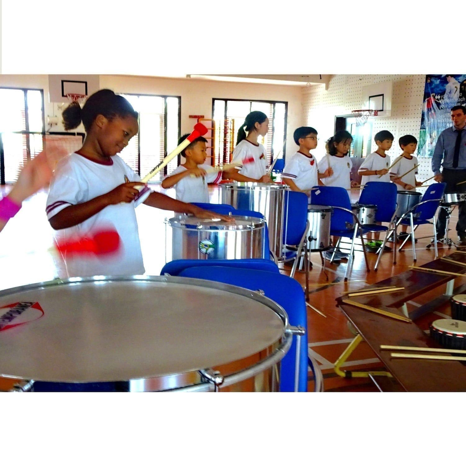 Action shot of students playing Brazilian Samba in Andy Gleadhill's workshop