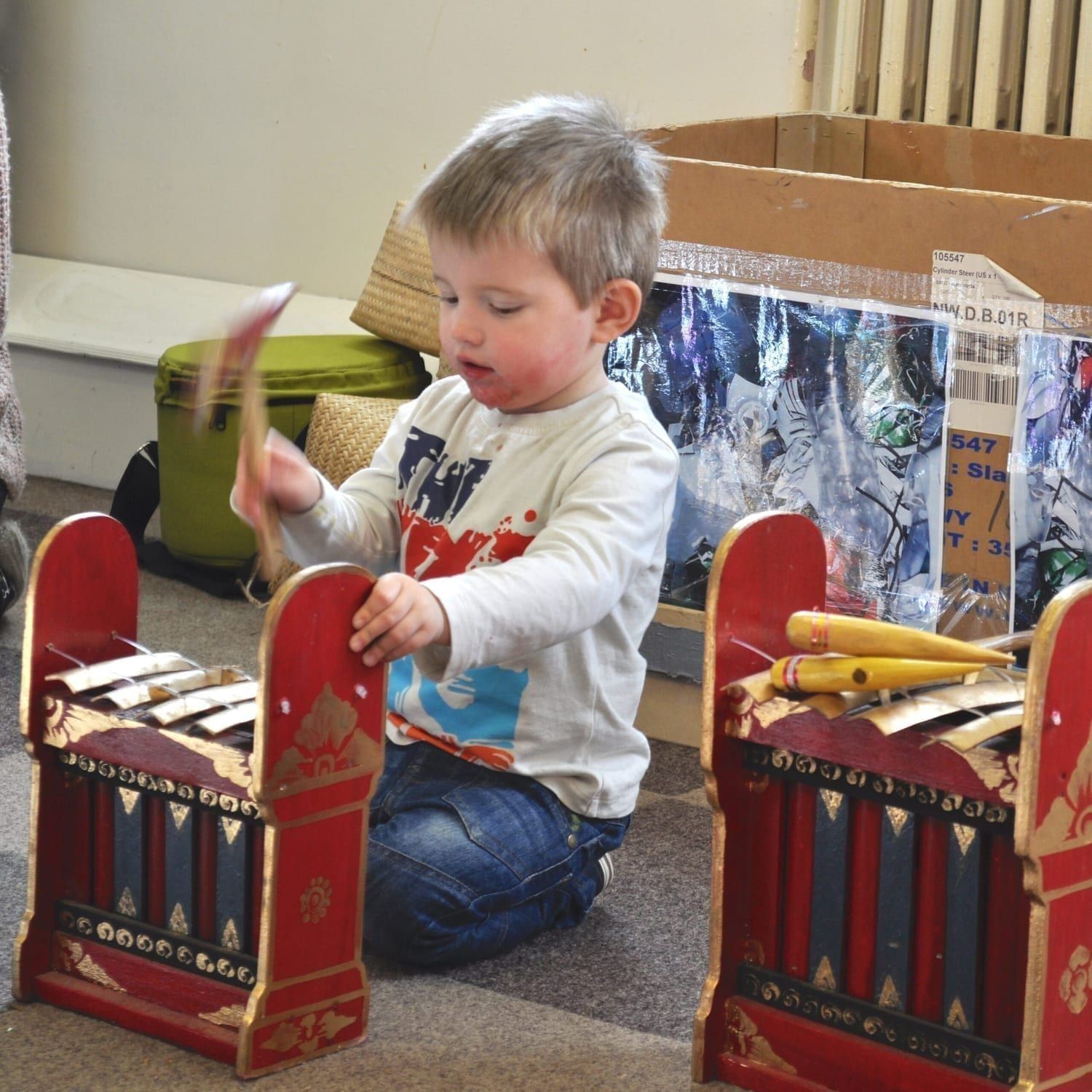 Action shot of students play Gamelan budget 4 key 3 pack