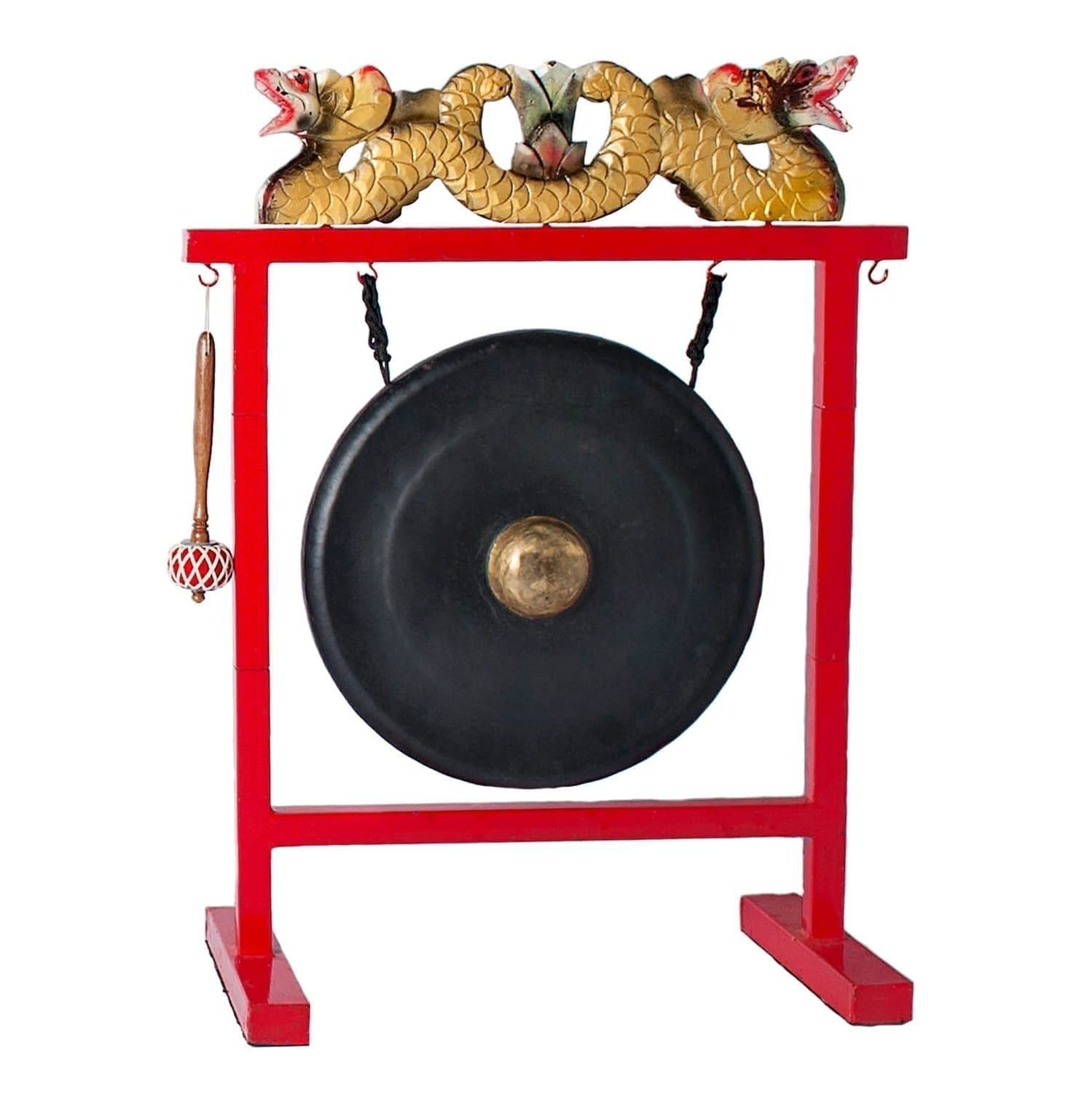 This is a product image of Drums for Schools Set of Gong 50cm diameter with Gong Stand and beater. The stand is in red colour and has a beautiful dragon carving on the head and hooks to hold the gong and beater.