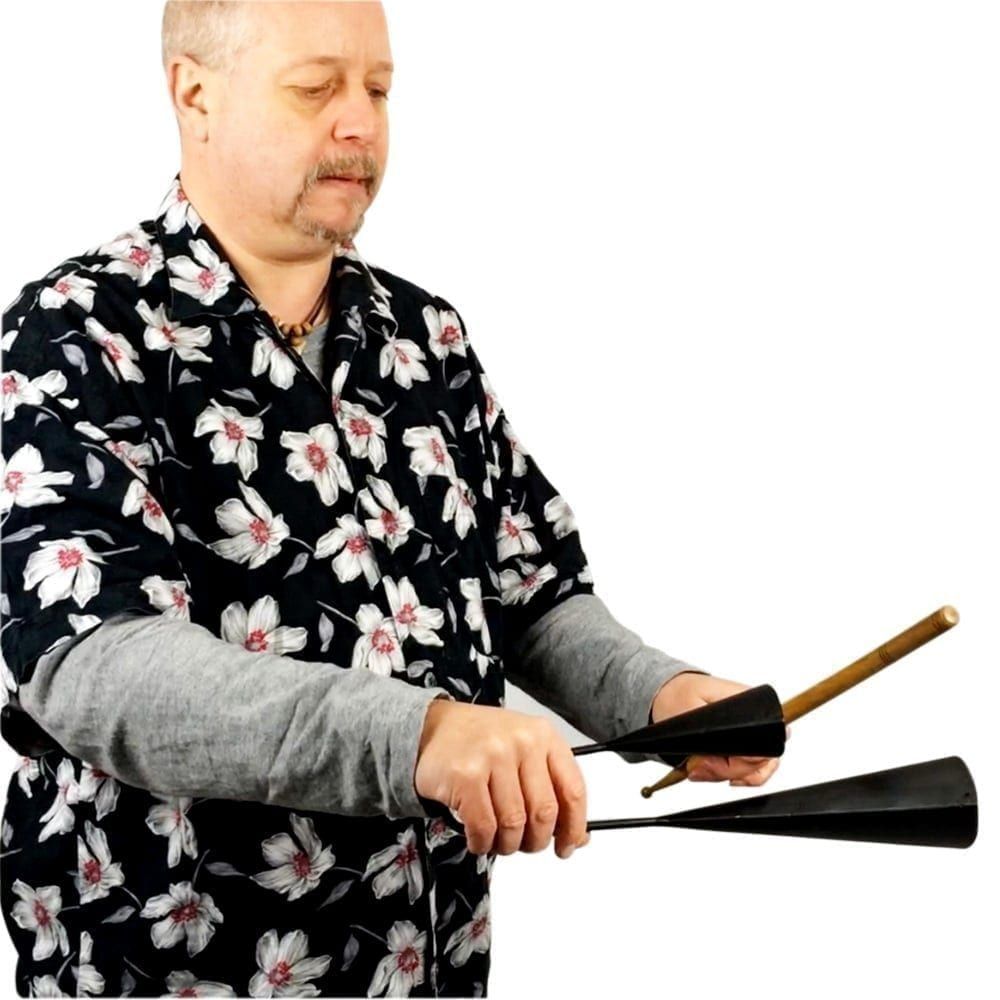 Image of Andy Gleadhil demonstrating how to play Agogo Bells