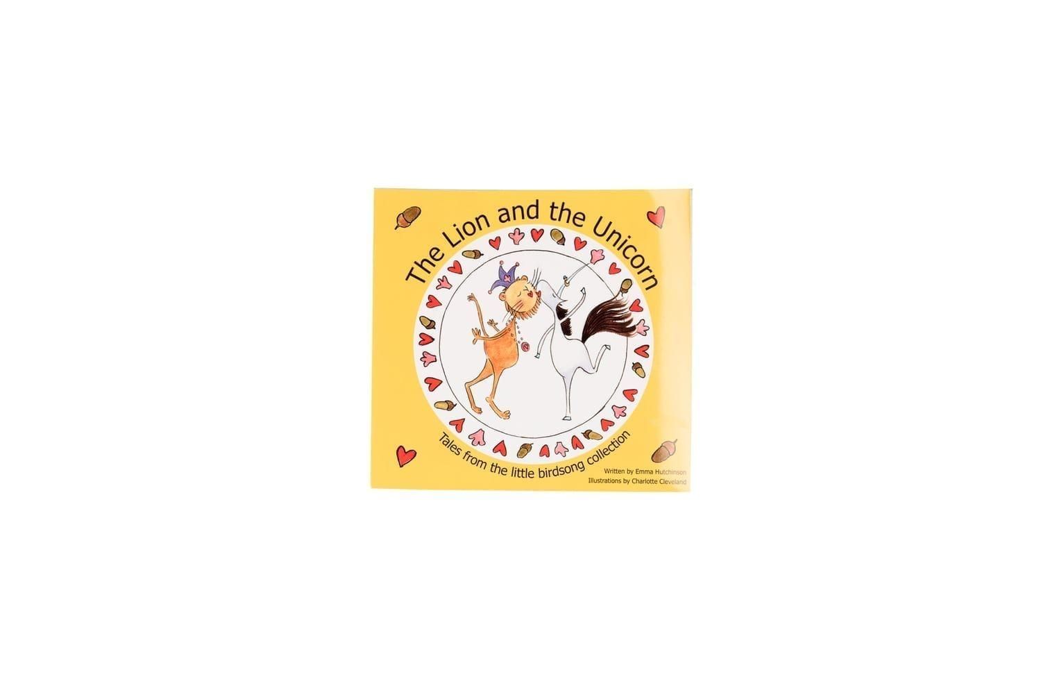 The Lion and the Unicorn illustrated cover—yellow, dancing lion and unicorn within a ring of hearts