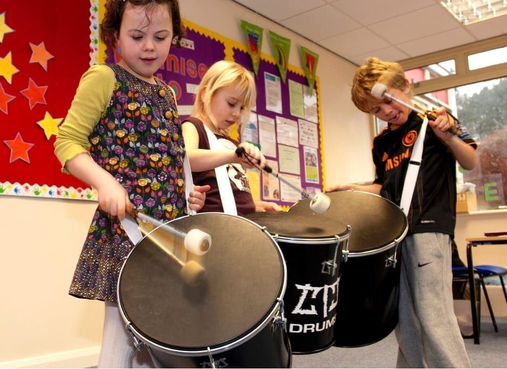 Children playing Samba drums