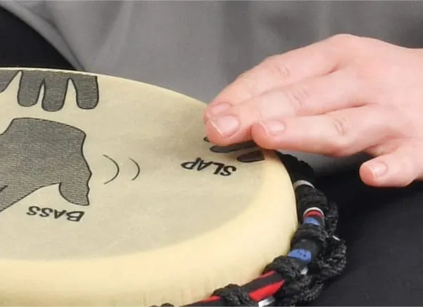 West African drumming pack featuring 10 Percussion Plus pre-tuned Djembe drums with colorful designs, ideal for group performances and educational use.