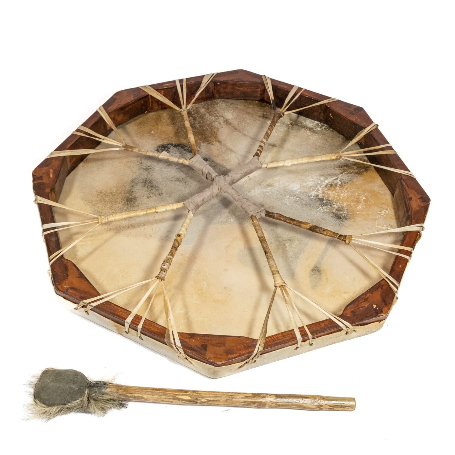 Photo of Drums for Schools Shaman Drum – 24in (60cm) diameter (OW-shdrpa60), painted, and its double-sided beater. back side. This octagonal frame drum has a variety of beautiful African animal designs painted on the goatskin playing surface.