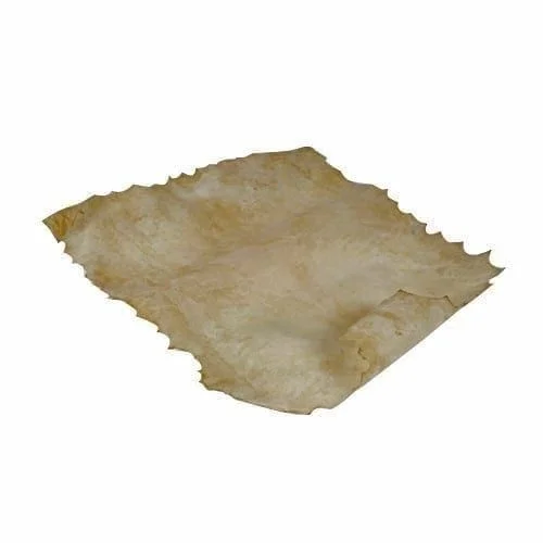 Piece of natural goatskin leather, commonly used for drum repairs or crafting, showcasing its raw and textured surface.