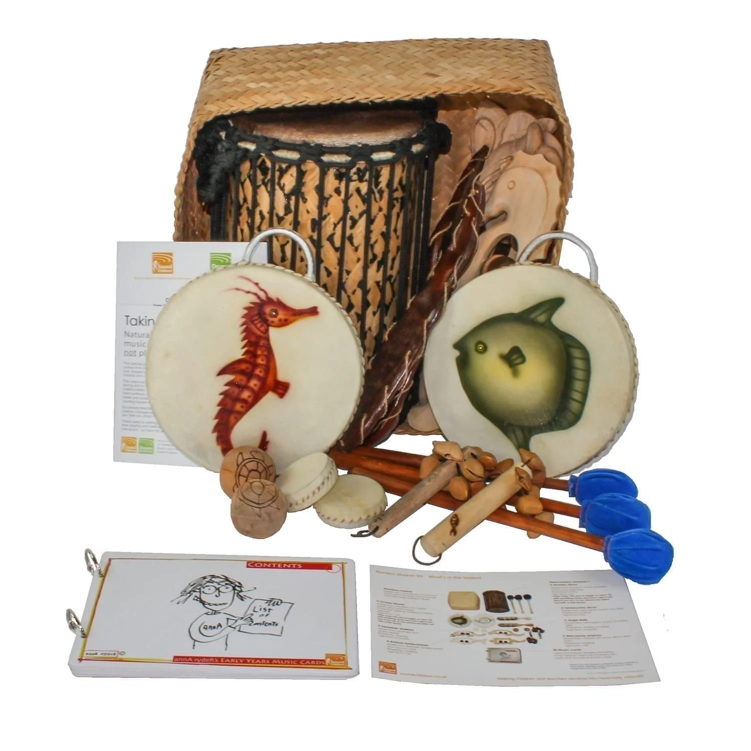 This is a product image of the Nursery Shaker Kit - 15 Instruments. The products are presented inside and around the Storage Basket with the documentation in front.