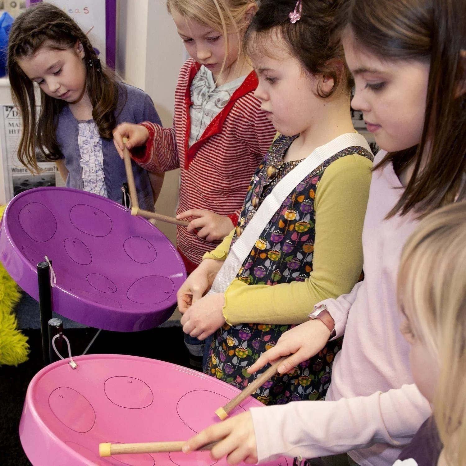 Image of Primary students playing Drums for School's Caribbean Steel Pan 