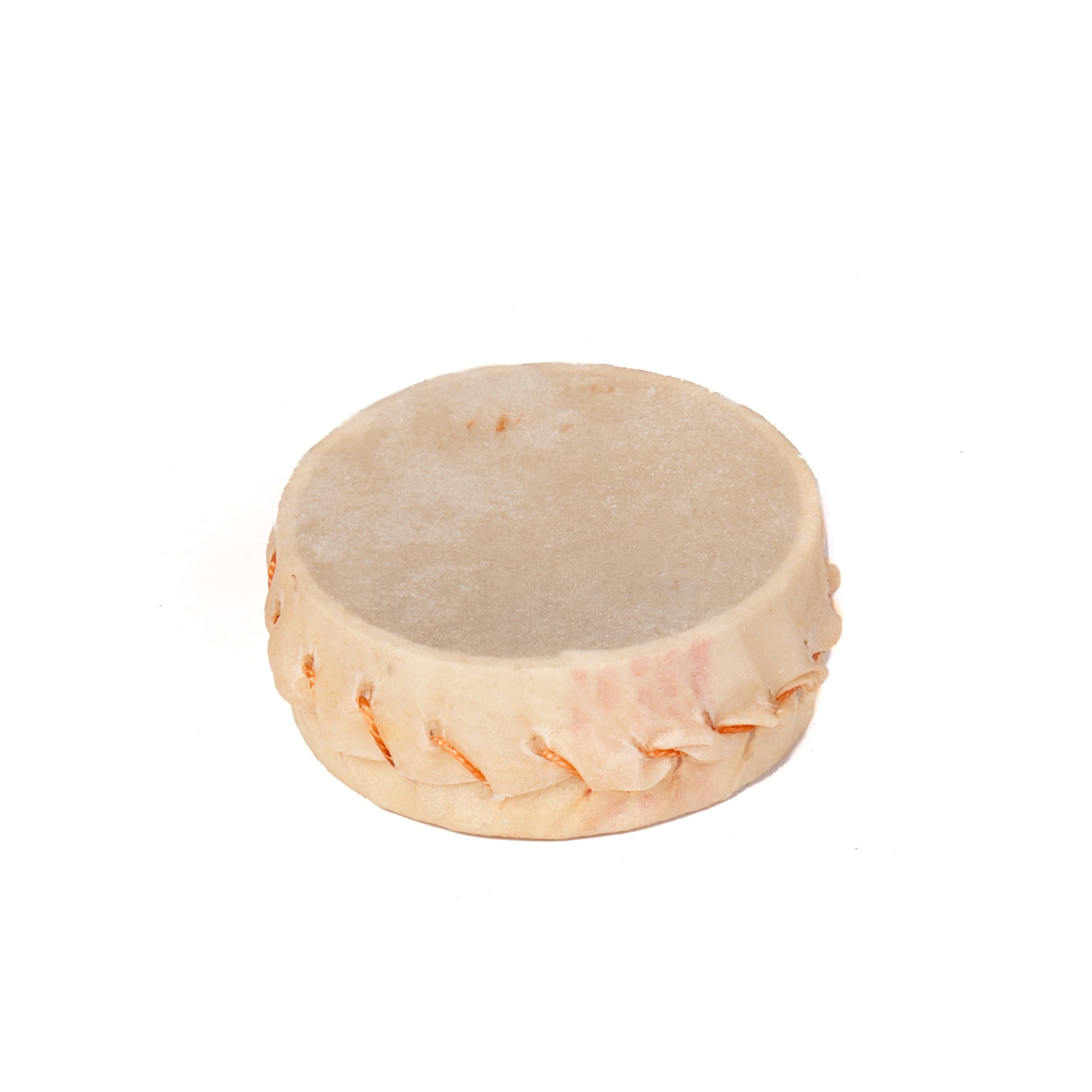 This is a product image of Drums for Schools Hear Shaker. It is a small goat skin box, stitched together with seeds on the inside.